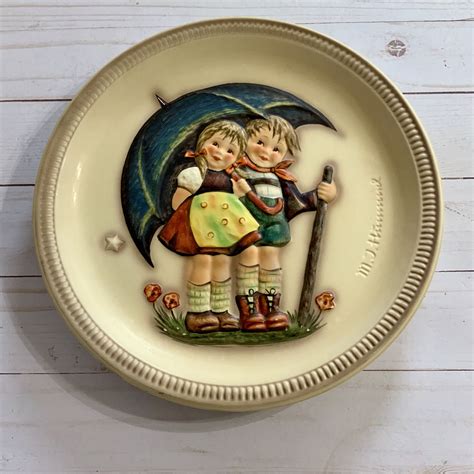 Hummel plate - M.J. Hummel Collector Plate Little Companions -"Surprise" by The Danbury Mint. Product information . Package Dimensions : 9.53 x 9.45 x 1.85 inches : Item Weight : 